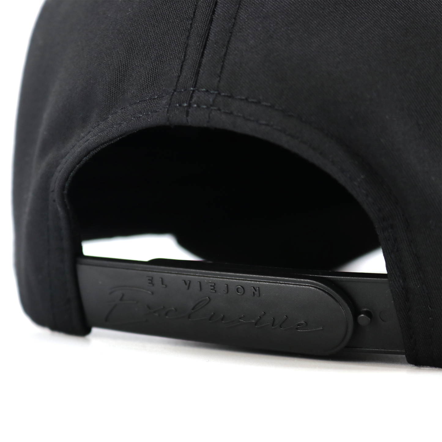 Black cap with a brand logo on the back against a white background