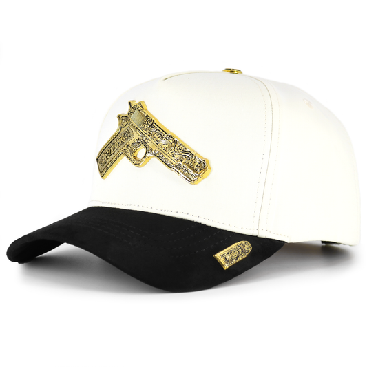 White and black cap with gold gun emblem on a white background