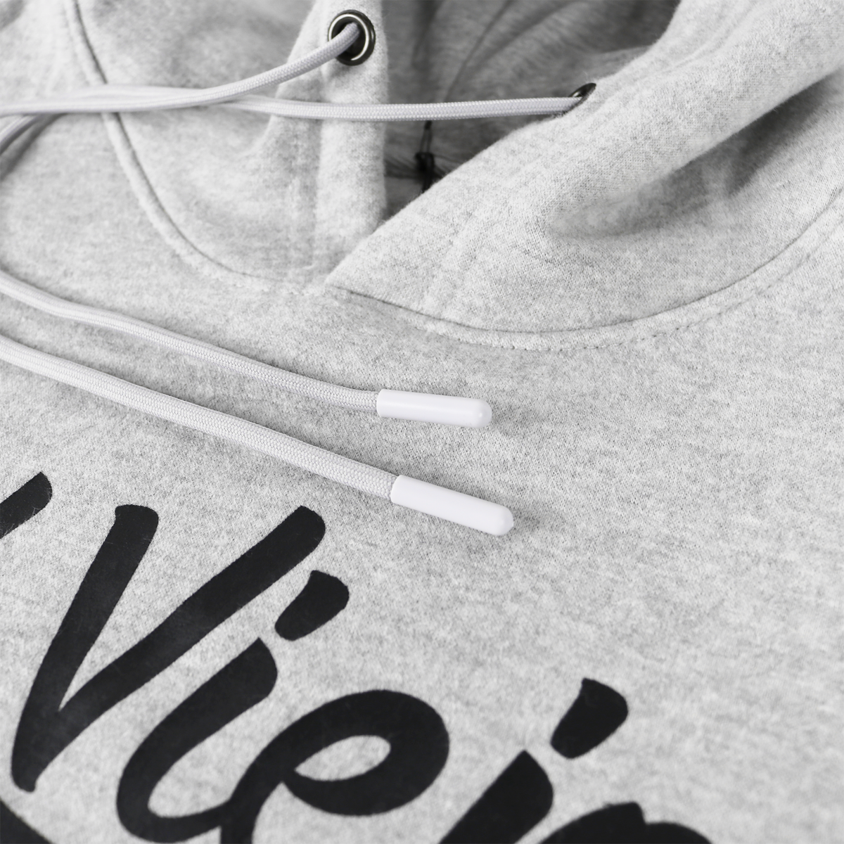 Close-up of a heather gray cotton/poly fleece hoodie with a black screen-printed logo and white drawstrings.