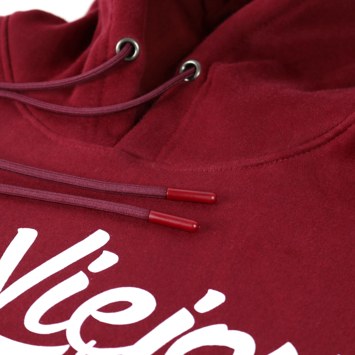 Close-up of a maroon cotton/poly fleece hoodie with white screen-printed logo and matching drawstrings.