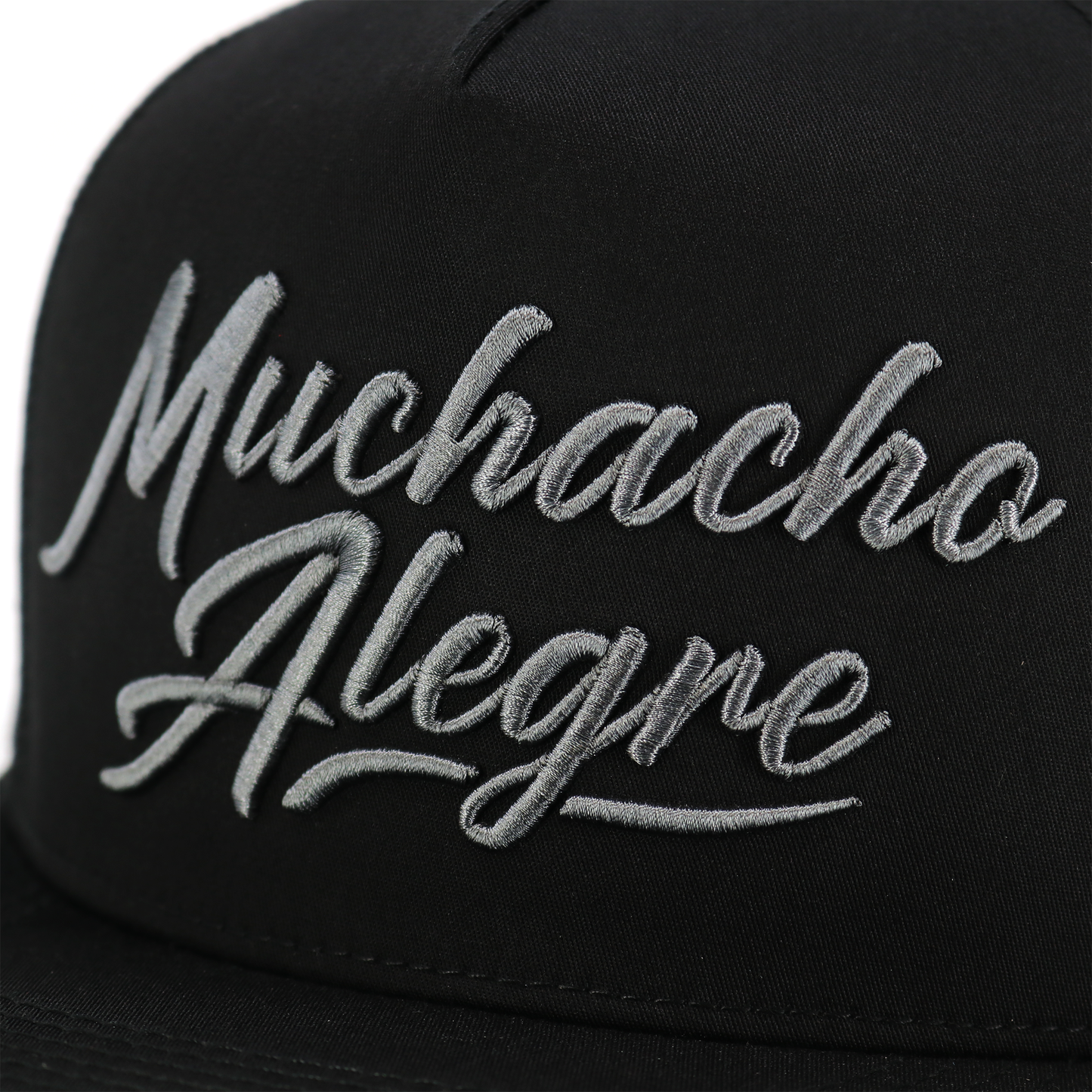 Muchacho Alegre black flat visor hat with charcoal embroidered logo.